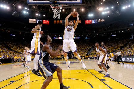 May 3, 2015; Oakland, CA, USA; Golden State Warriors center Andrew Bogut (12) holds onto a rebound against the Memphis Grizzlies during the third quarter in game one of the second round of the NBA Playoffs at Oracle Arena. Mandatory Credit: Cary Edmondson-USA TODAY Sports