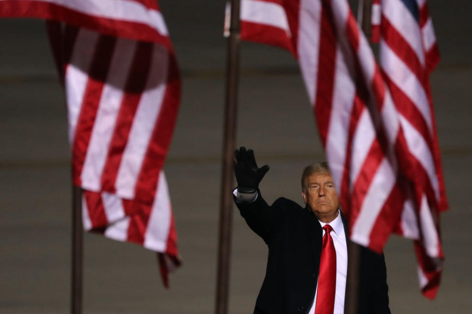 U.S. President Donald Trump waves to supporters at the conclusion of a campaign rally at Rochester International Airport October 30, 2020 in Rochester, Minnesota. With Election Day only four days away, Trump is campaigning in Minnesota despite the recent surge in coronavirus cases in the state.<span class="copyright">Chip Somodevilla-Getty Images</span>