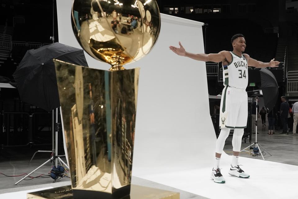 Milwaukee Bucks' Giannis Antetokounmpo poses for a picture during an NBA basketball media day Monday, Sept. 27, 2021, in Milwaukee. (AP Photo/Morry Gash)