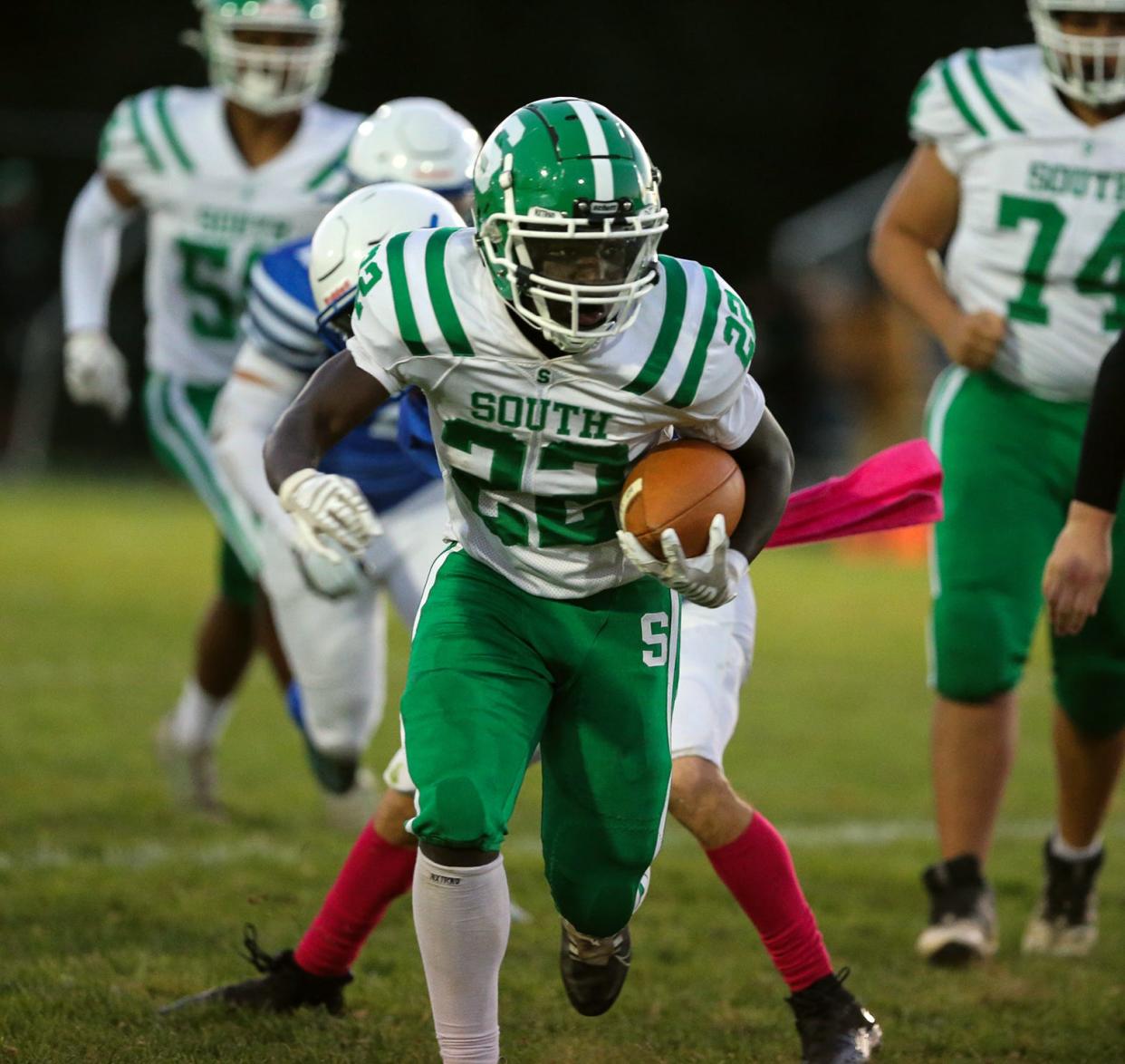 South Hagerstown's JoJo Davis breaks through the Williamsport defense for a touchdown.