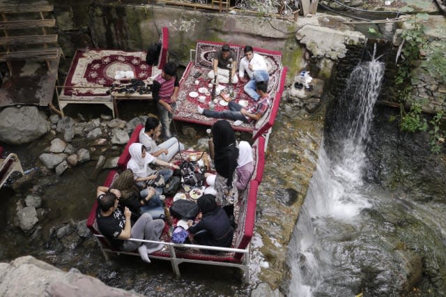 Seating in river in Darband