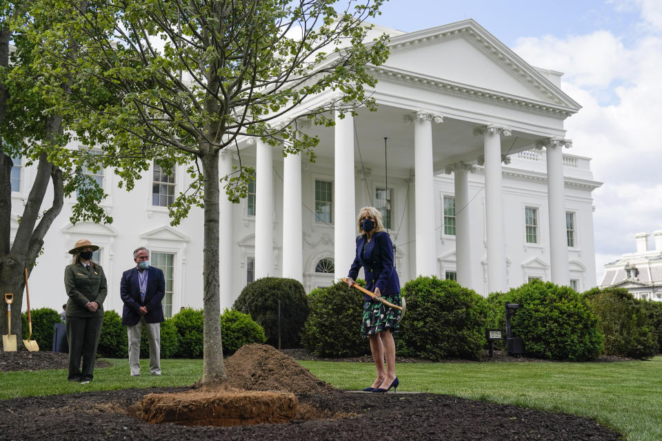 First lady Jill Biden participates in an Arbor Day tree planting ceremony at the White House, Friday, April 30, 2021, in Washington. (AP Photo/Evan Vucci)