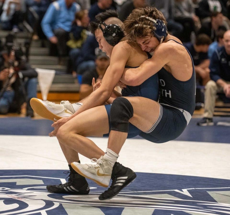 Middletown South's Jack Zaleski (right) defeated Howell's Sebastian Ortega 3-1 to win the Shore Conference Tournament 126-pound championship