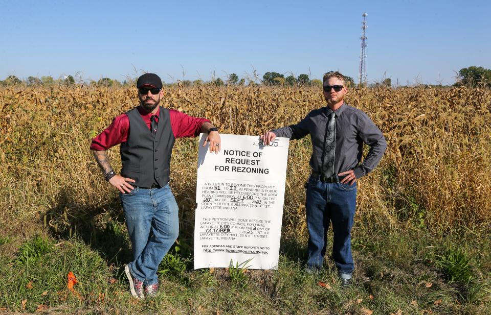 Michael Saine and Gabriel Deise speak out against the rezoning request that Irving Materials Inc. filed with the Tippecanoe County Area Planning Commission and City of Lafayette to allow the company to rezone property that sits along South 100 West, on Thursday, Oct. 12, 2023, in Lafayette, Ind.