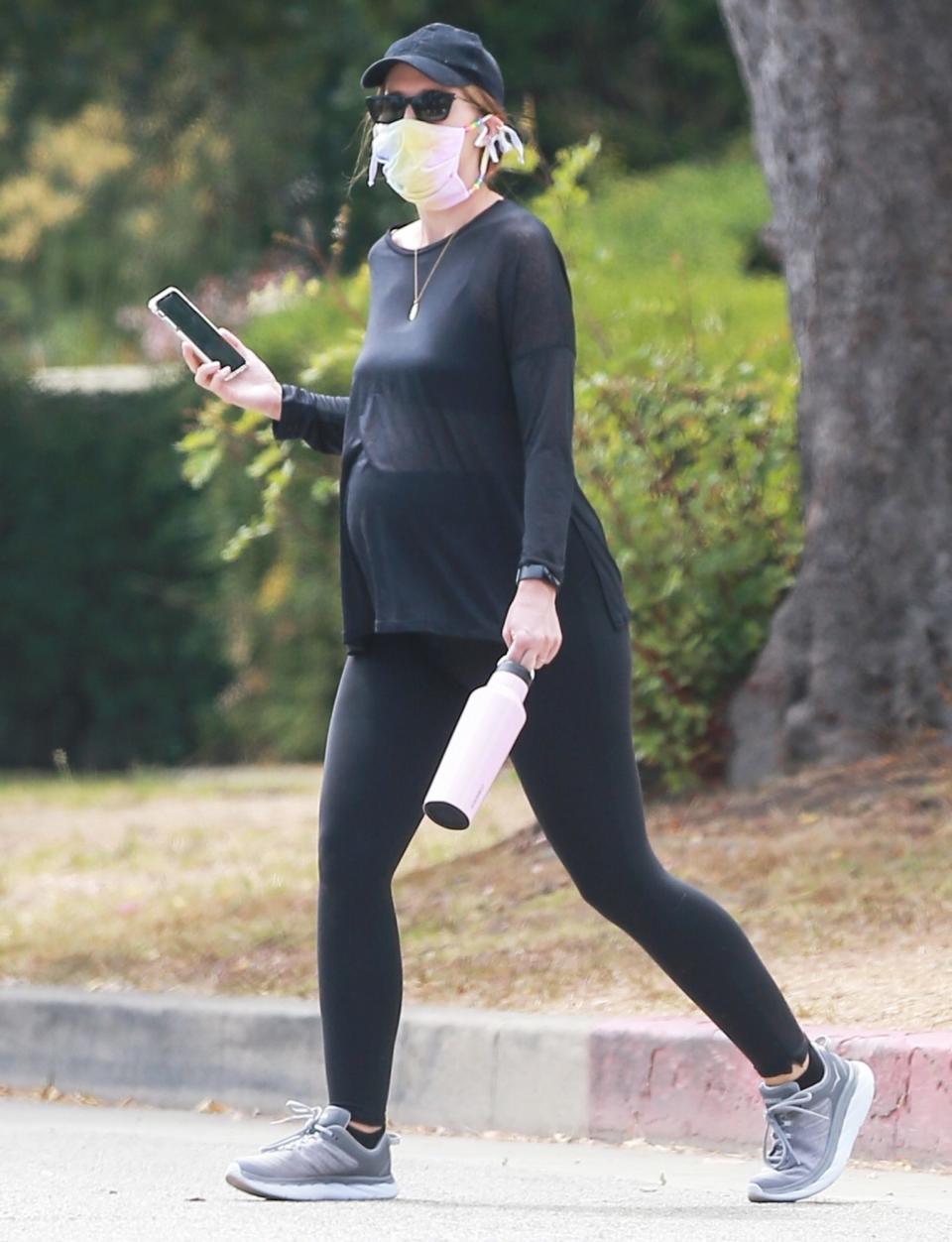 <p>Mom-to-be Katherine Schwarzenegger keeps up with her daily walks in Santa Monica on Wednesday.</p>