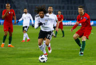 Soccer Football - International Friendly - Portugal vs Egypt - Letzigrund, Zurich, Switzerland - March 23, 2018 Egypt’s Mohamed Elneny in action with Portugal's Cristiano Ronaldo REUTERS/Arnd Wiegmann