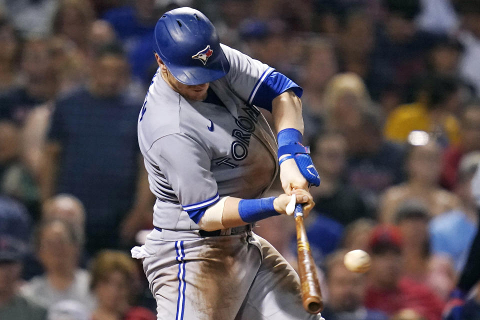 Toronto Blue Jays' Danny Jansen connects for a solo home run in the sixth inning of a baseball game against the Boston Red Sox, Thursday, Aug. 25, 2022, in Boston. (AP Photo/Charles Krupa)