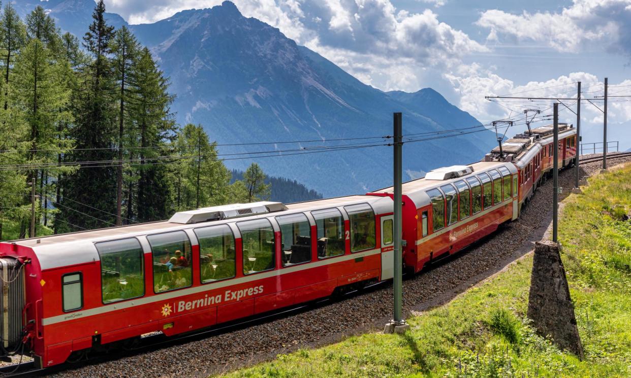 <span>‘I commend the Swiss system, with its emphasis on integration of all public transport into an impressive network.’ The Bernina Express in Graubünden, Switzerland.</span><span>Photograph: Kim Petersen/Alamy</span>