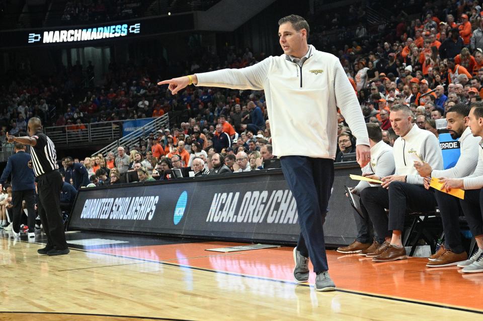 Preston Spradlin coaching Morehead State in the first round of the NCAA Tournament.