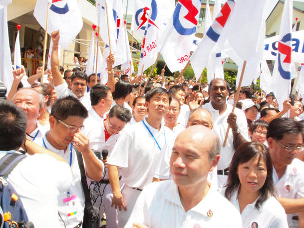 Supporters for the PAP Tanjong Pagar team on Nomination Day at the Singapore Chinese Girls' School. On that day, supporters carried flags, banners and placards. (Yahoo! photo)