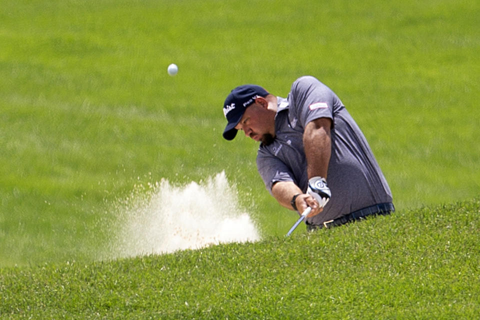 Brendon de Jonge hits from a bunker during the first round of the 3M Open golf tournament in Blaine, Minn., Thursday, July 23, 2020. (AP Photo/Andy Clayton- King)