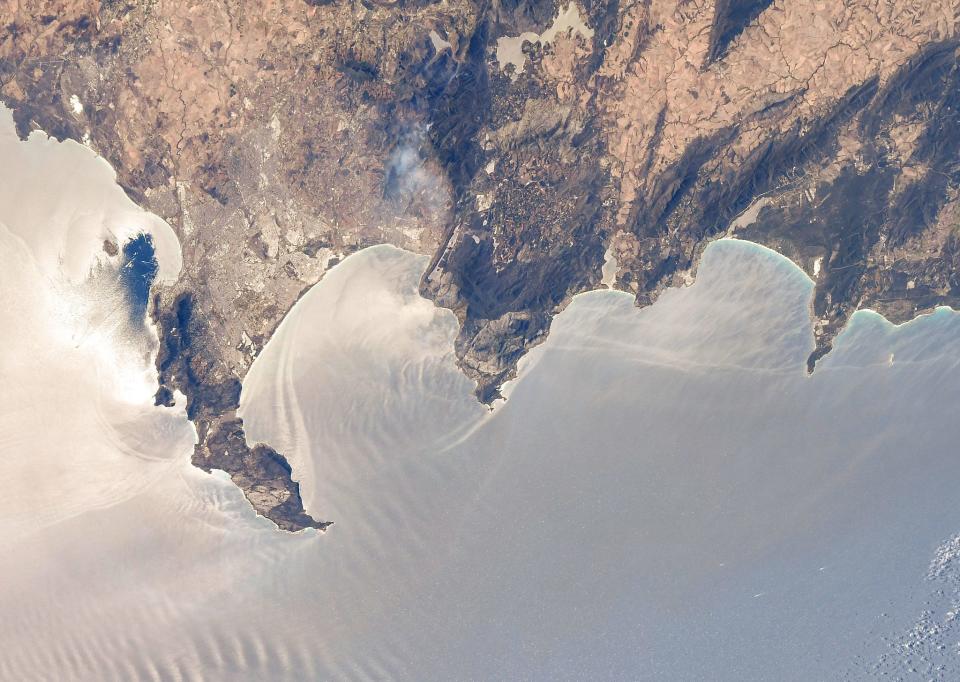 cape town jagged mountainous coast extends into silvery atlantic waters