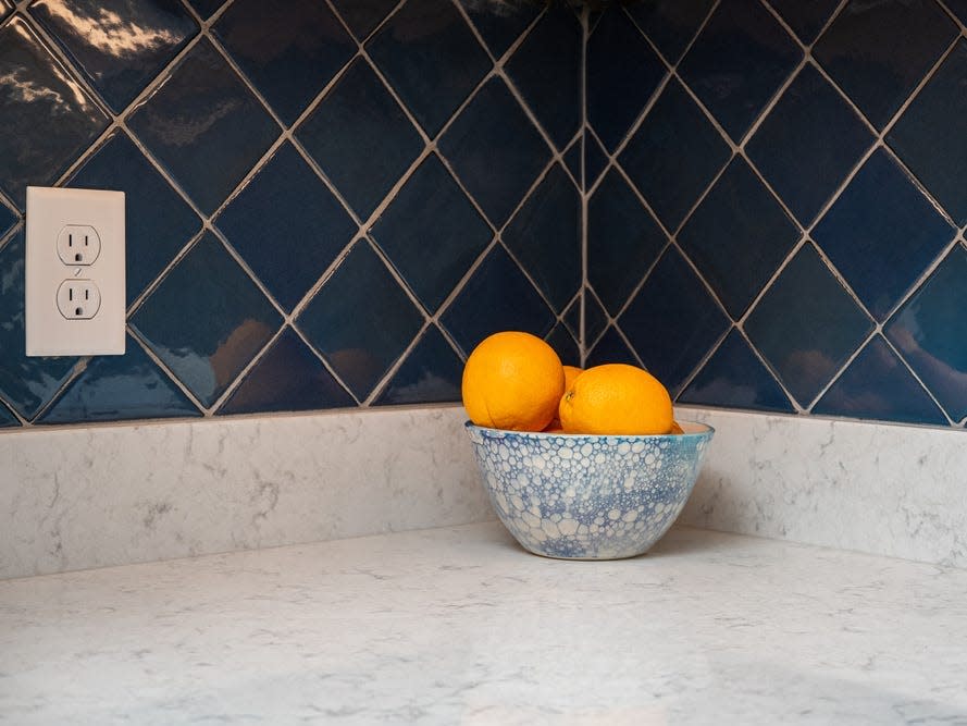 blue tiles white countertop