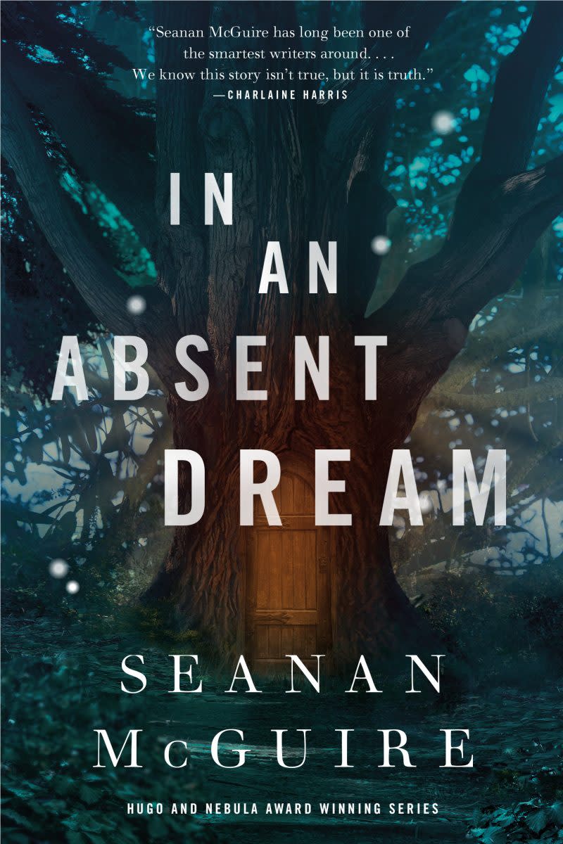 The Cover for In An Absent Dream shows a tree and a door under the title