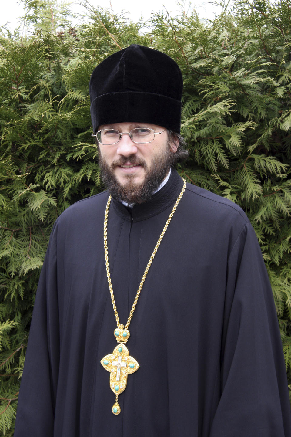This 2008 photo provided by Cyril Hovorun shows him at the Kiev-Pechersk Lavra, the Monastery of the Caves, in Kiev, Ukraine. In 2012 Hovorun was an official within the Moscow Patriarchate, but he resigned after hackers published emails showing that he secretly supported independence-leaning Ukrainian clergy. “We've known about this tactic before the hacking of the Democrats,” Hovorun said, referring to the email disclosures that rocked America’s 2016 presidential campaign. “This is a familiar story for us.” (Courtesy Cyril Hovorun via AP)