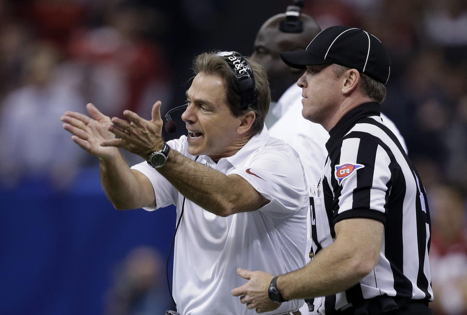 Alabama coach Nick Saban makes a point to an official during the first half of the Sugar Bowl NCAA college football game against Oklahoma, Thursday, Jan. 2, 2014, in New Orleans. (AP Photo/Patrick Semansky)