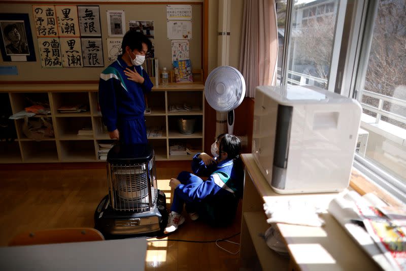 The Wider Image: Last students graduate: School closures spread in ageing Japan