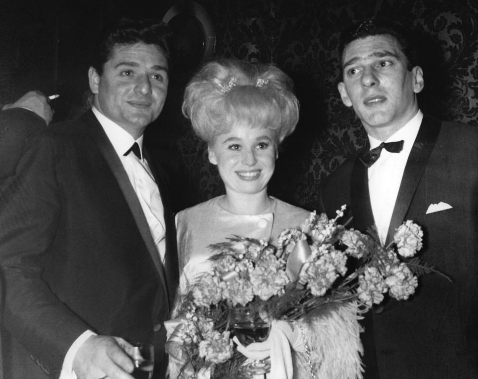 Reggie Kray, right, at a film premiere with actress Barbara Windsor and her husband Ronnie Knight, an associate of the Kray Twins, circa 1969.   (Photo by Keystone/Getty Images)