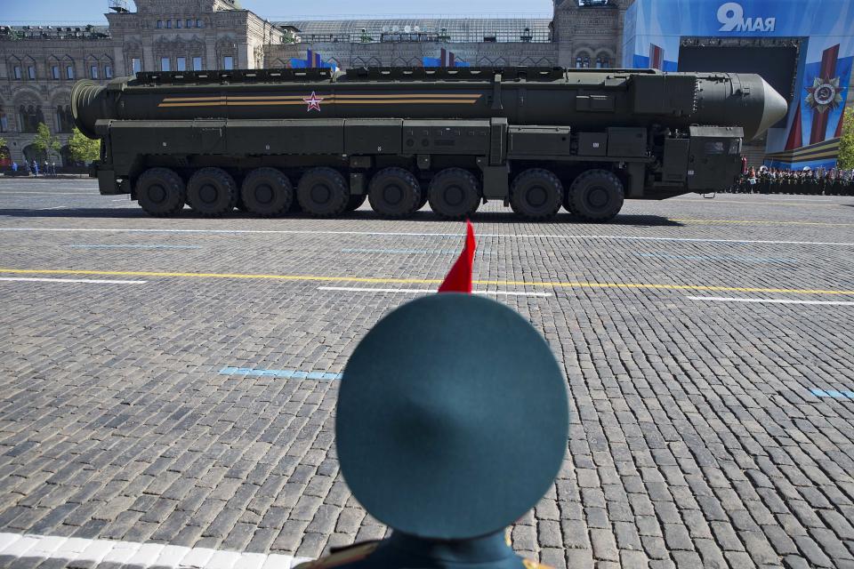 Russian intercontinental ballistic missile Topol-M rolls across Red Square during the Victory Day Parade, which commemorates the 1945 defeat of Nazi Germany in Moscow, Russia, Friday, May 9, 2014. Thousands of Russian troops march on Red Square in the annual Victory Day parade in a proud display of the nation's military might amid escalating tensions over Ukraine. (AP Photo/Pavel Golovkin)