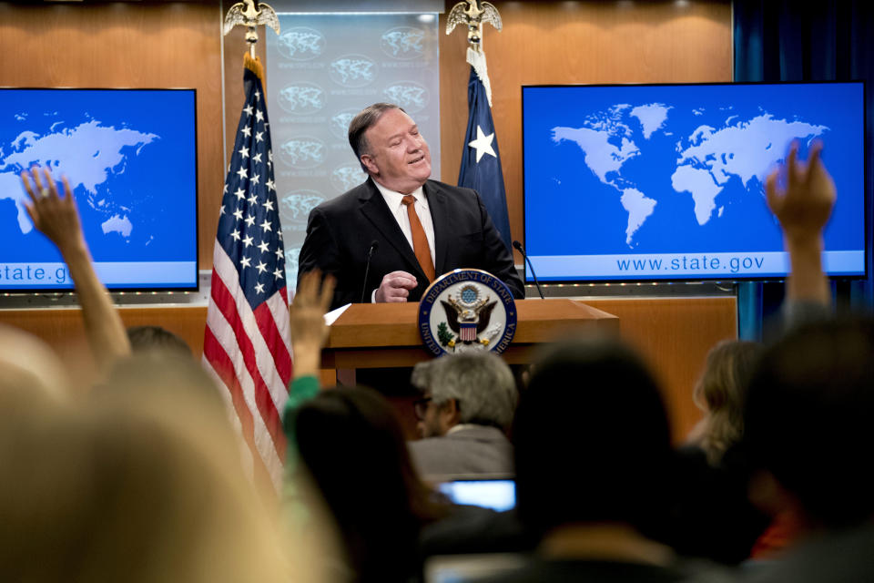 Secretary of State Mike Pompeo speaks at a news conference in the press briefing room at the State Department in Washington, Friday, Sept. 14, 2018, in Washington. Pompeo says his Obama-era predecessor John Kerry has been 'actively undermining' U.S. policy on Iran. (AP Photo/Andrew Harnik)