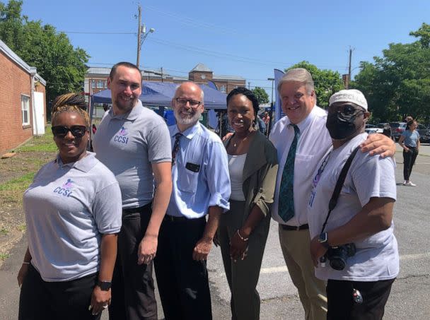 PHOTO: Leadership at Community Crisis Services in Hyattsville, Md., gather after a press conference on the implementation of the new National Suicide Prevention Lifeline number, 988, on July 12, 2022. (Nathan Dimes)