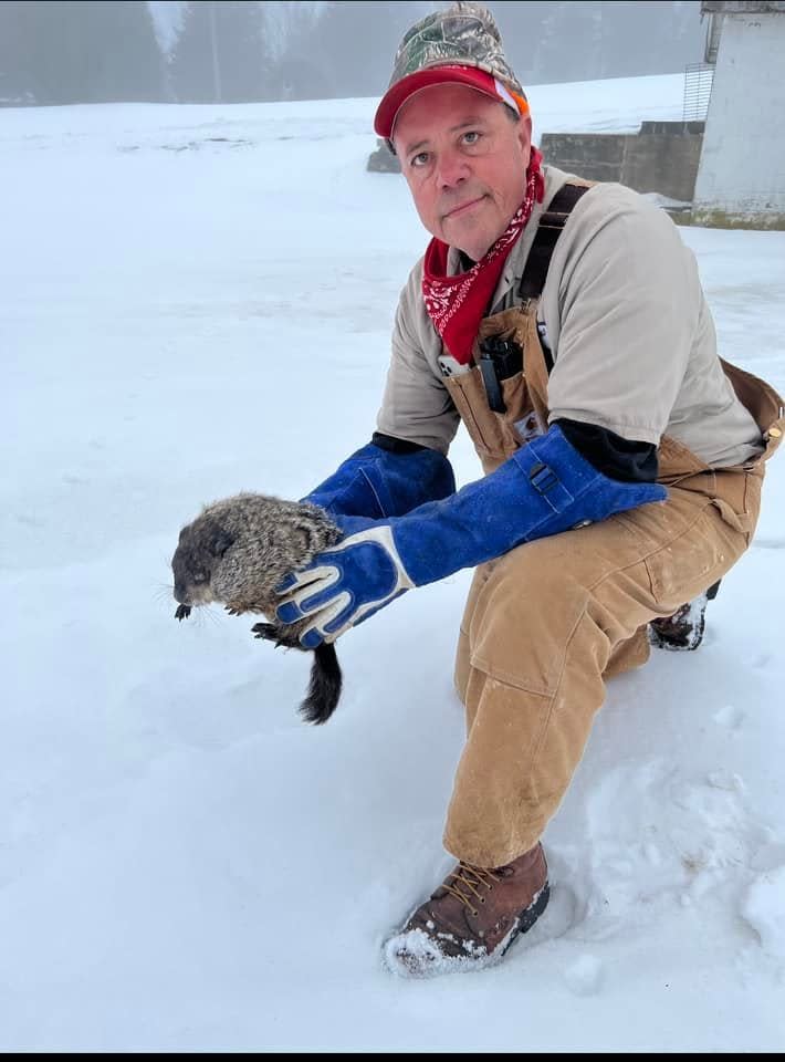 Stonewall the Groundhog, Space Farms Zoo and Museum's resident weather expert, appears sans shadow with Parker Space, zoo owner and  24th District assemblyman, to signify an early spring for the region Wednesday, Feb. 2, 2022.