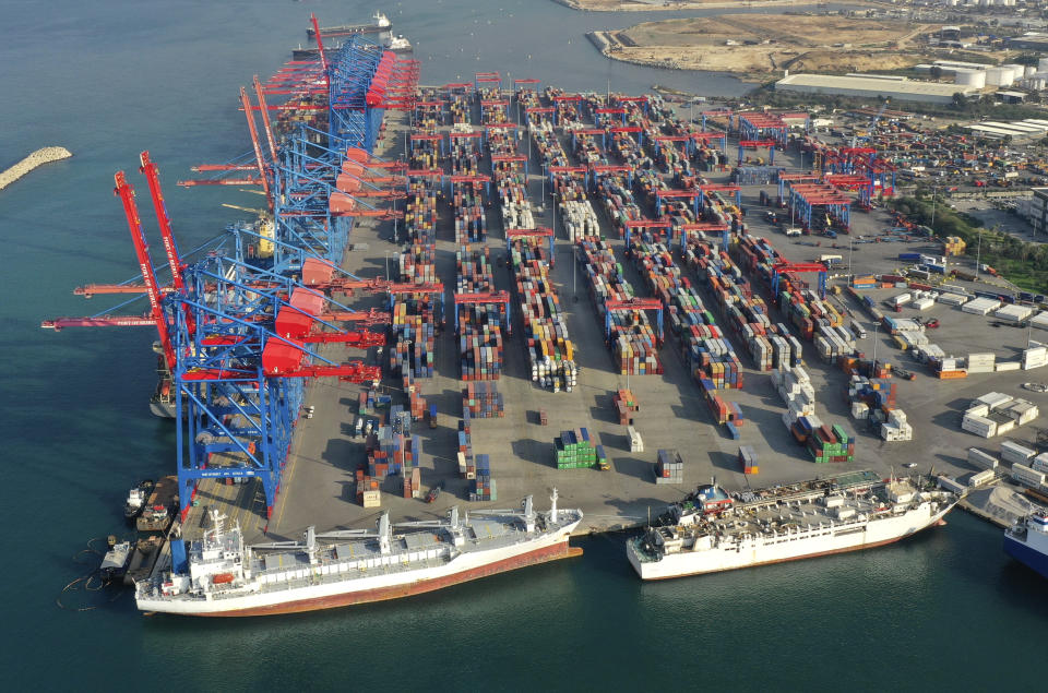 A drone picture shows a general view of containers piled up at one of Beirut's seaport terminals, in Beirut, Lebanon, Nov. 30, 2018. In recent weeks, Lebanon has been looking for stronger economic relations with eastern countries including China, Iraq and Russia as western countries and oil-rich gulf states have abstained from helping Prime Minister Hassan Diab's government that is backed by Hezbollah and its allies.(AP Photo/Hussein Malla)