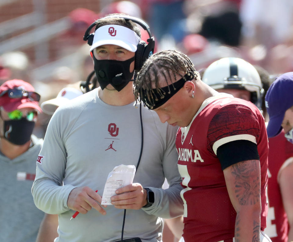 Oklahoma Sooners QB Spencer Rattler (7) speaks with head coach Lincoln Riley during the second half against Kansas State. (Kevin Jairaj-USA TODAY Sports)