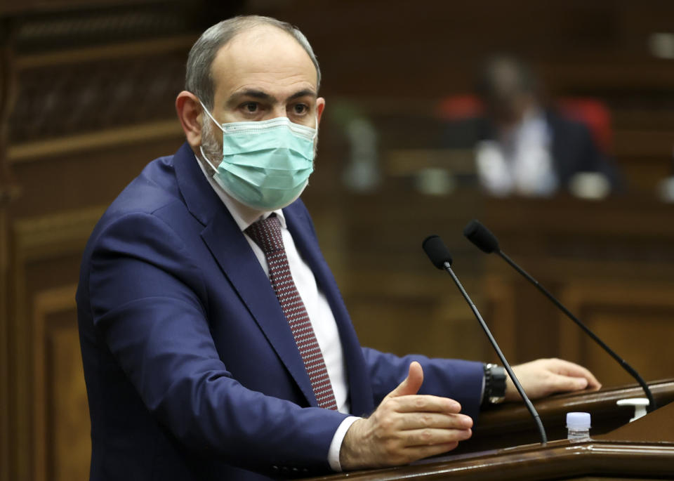 Armenian Prime Minister Nikol Pashinyan delivers his speech in the Parliament building in Yerevan, Armenia, Wednesday, March 3, 2021. Armenia’s prime minister has scored a point in his spat with the top military brass, advancing his motion to fire the country’s top military officer. A political crisis sparked by Armenia’s defeat in the conflict with Azerbaijan over the Nagorno-Karabakh region escalated last week when the military’s General Staff demanded the resignation of Prime Minister Nikol Pashinyan following his move to dismiss a top general. (Tigran Mehrabyan/PAN Photo via AP)