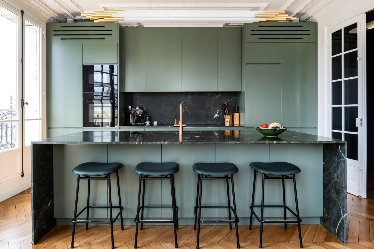  Green kitchen with black. 