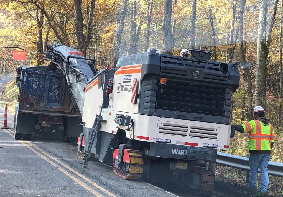 Crews make repairs on Fairground Road in preparation for a resurfacing project later this year.