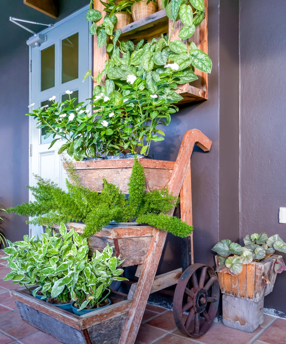 11. Put a vertical plant display on your porch