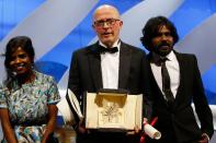 French director Jacques Audiard on stage with his actors from Palme d'Or winning "Dheepan"