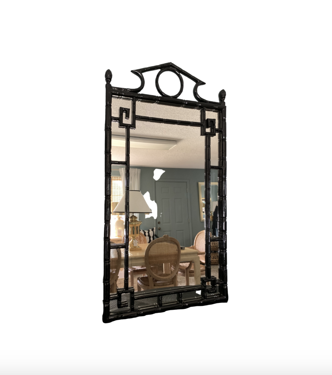 <p><a href="https://www.dressingroomsinteriorsstudio.com/shoponline/vintage-faux-bamboo-greek-key-mirror" rel="nofollow noopener" target="_blank" data-ylk="slk:Shop Now;elm:context_link;itc:0;sec:content-canvas" class="link rapid-noclick-resp">Shop Now</a></p><p>Vintage Greek Mirror</p><p>dressingroomsinteriorsstudio.com</p><p>$495.00</p><span class="copyright">Courtesy</span>