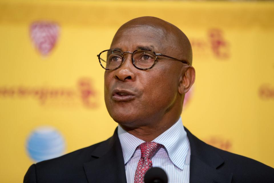 University of Southern California's new athletic director, Lynn Swann takes questions during a news conference at the USC campus in Los Angeles, Thursday, April 14, 2016. Although Swann has no experience in high-level collegiate athletic administration, he is the third straight former USC football player to take the post. The former wide receiver, a Pro Football Hall of Famer, will succeed Pat Haden on July 1. (AP Photo/Damian Dovarganes)