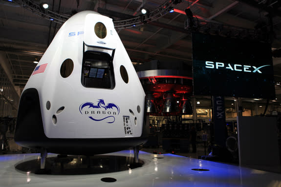 SpaceX unveiled its Dragon V2 spacecraft on May 29, 2014, showcasing a 21st-century space capsule built to carry astronauts into orbit. SpaceX founder and CEO Elon Musk detailed aspects of the design that was developed in partnership with NASA'