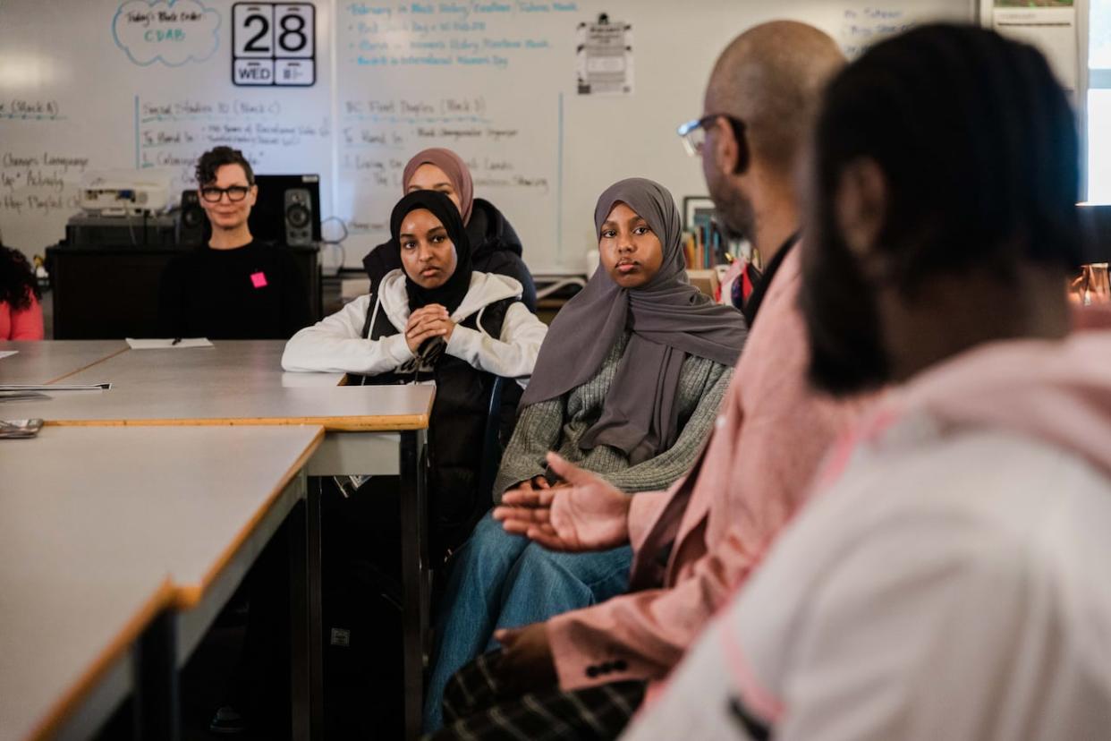 A Black Students' Union at a Surrey, B.C. high school meets for an event on February 28. Ontario is moving to make learning about Black history compulsory in three grades — a move whose rollout some are worried about.  (Gian Paolo Mendoza/CBC - image credit)