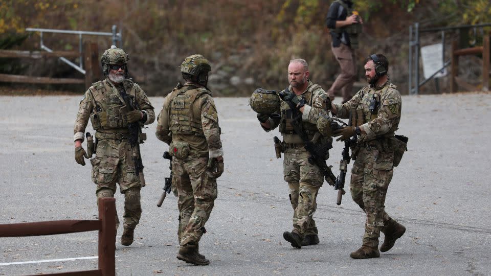 Law enforcement members patrol near a Lisbon school, following a deadly mass shooting in Lewiston, in Lisbon Falls, Maine, U.S. October 26, 2023.  REUTERS/Shannon Stapleton - Shannon Stapleton/Reuters