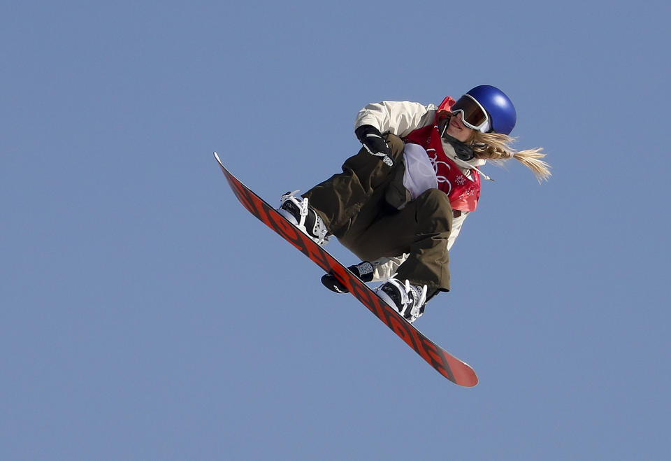 FILE -Anna Gasser, of Austria, jumps for the second time in the women's Big Air snowboard final at the 2018 Winter Olympics in Pyeongchang, South Korea, Thursday, Feb. 22, 2018. More than 20 years after their sport was brought into the Olympics to give the Games a more vibrant feel, snowboarders still feel like second-class citizens. (AP Photo/Matthias Schrader, File)