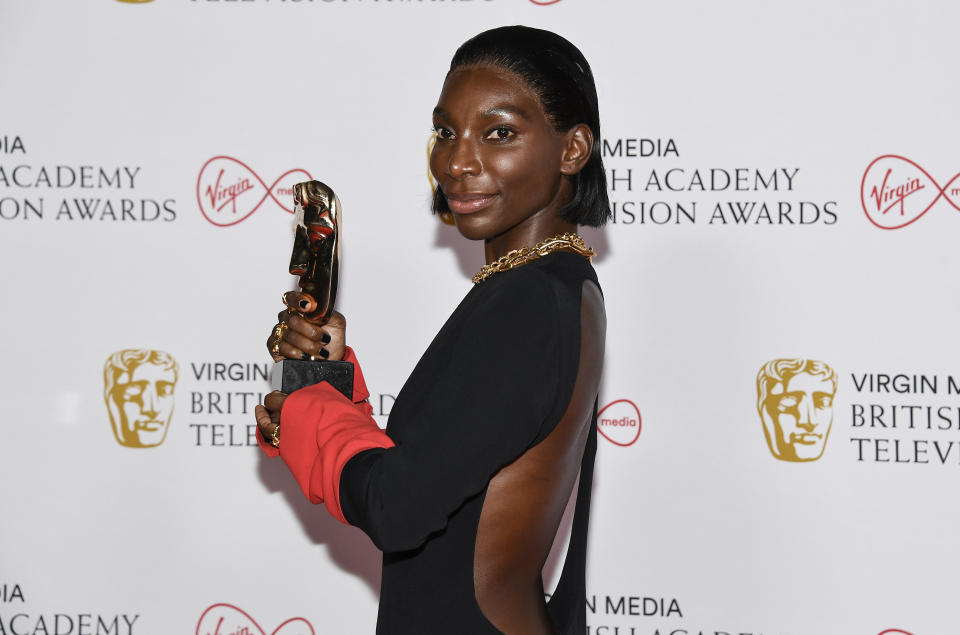 Michaela Coel poses for photographers with his Leading Actress award for her role in 'I May Destroy You' backstage at the British Academy Television Awards in London, Sunday, June 6, 2021. (AP Photo/Alberto Pezzali)