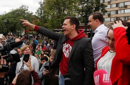 Russian opposition figure Ilya Yashin addresses his supporters at a rally in Moscow