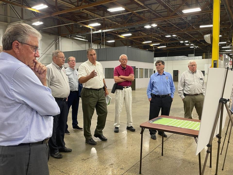 Dean Marske, center, with HKG Architects talks about the proposed pod set up for the Brown County Regional Jail.