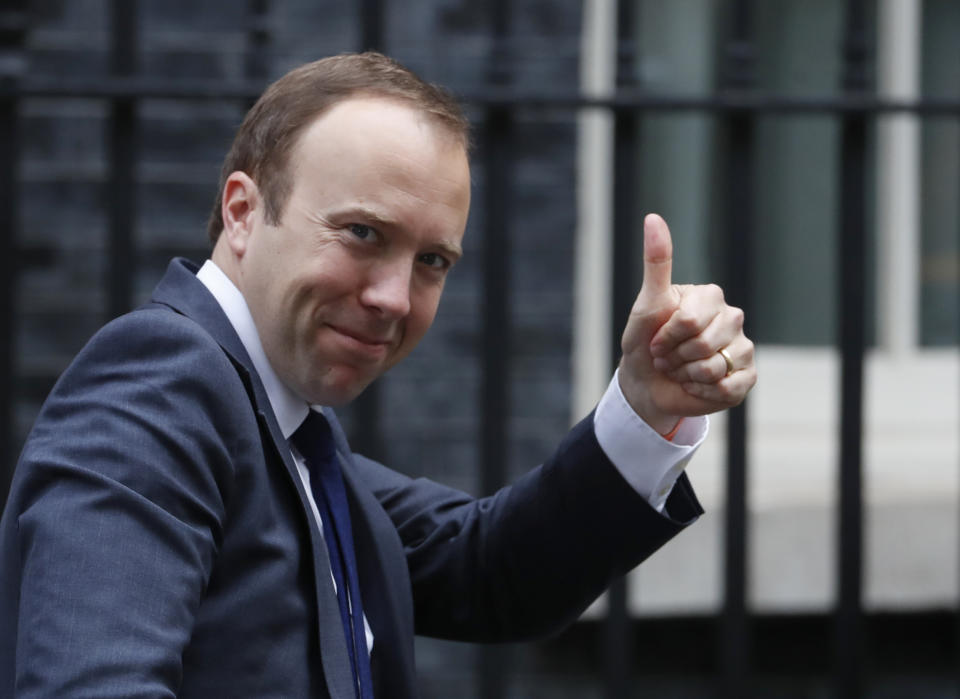 Matt Hancock Secretary of State for Health and Social Care gestures as he arrives at 10 Downing Street following a cabinet meeting in London, Tuesday, June 11, 2019. Hancock is a candidate to replace Prime Minister Theresa May as leader of the Conservative Party. (AP Photo/Alastair Grant)