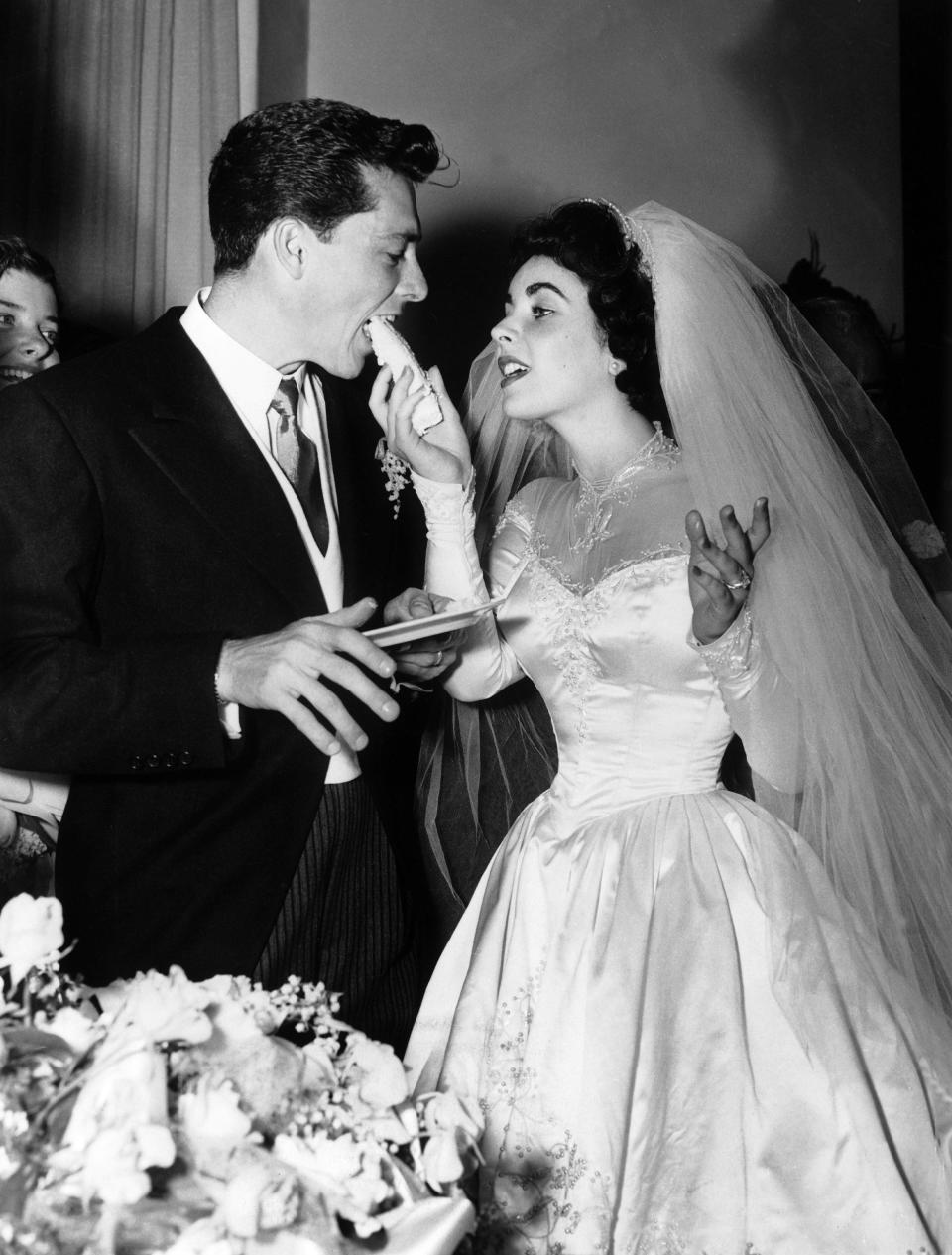 elizabeth feeding conrad wedding cake