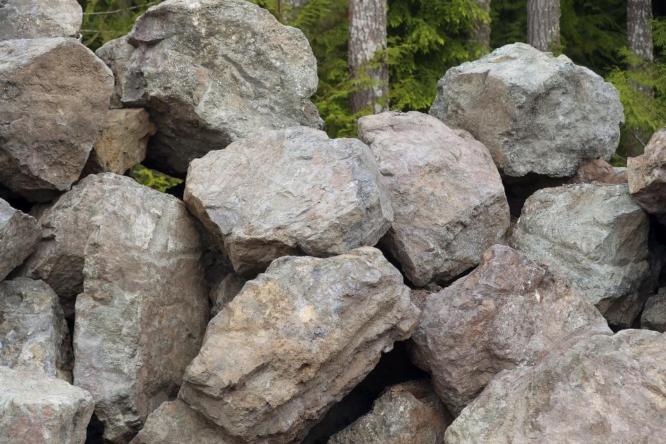 Large boulders mined from Ueland Tree farm's newest Rock Quarry.