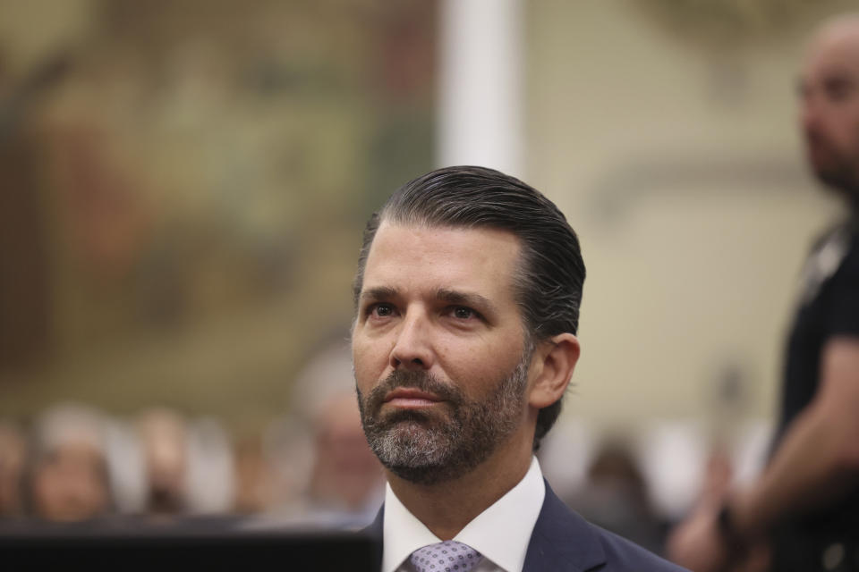 Donald Trump, Jr. sits in the courtroom with his legal team before the continuation of the civil business fraud trial at New York Supreme Court, Monday, Nov. 13, 2023, in New York. (Brendan McDermid/Pool Photo via AP)