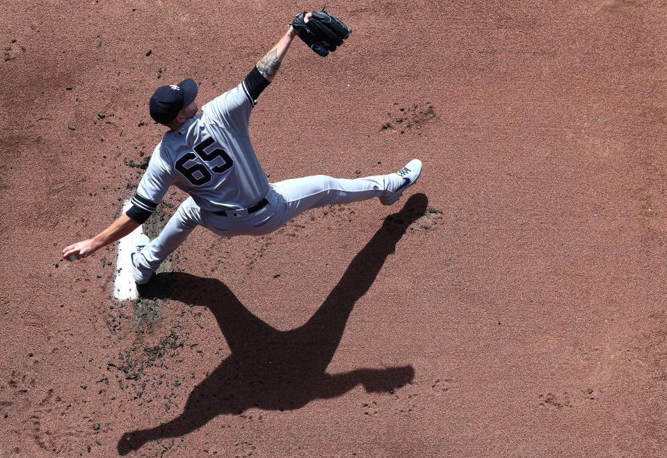 SEATTLE, WASHINGTON - AUGUST 28: James Paxton #65 of the New York Yankees warms up prior to taking on the Seattle Mariners during their game at T-Mobile Park on August 28, 2019 in Seattle, Washington. (Photo by Abbie Parr/Getty Images)