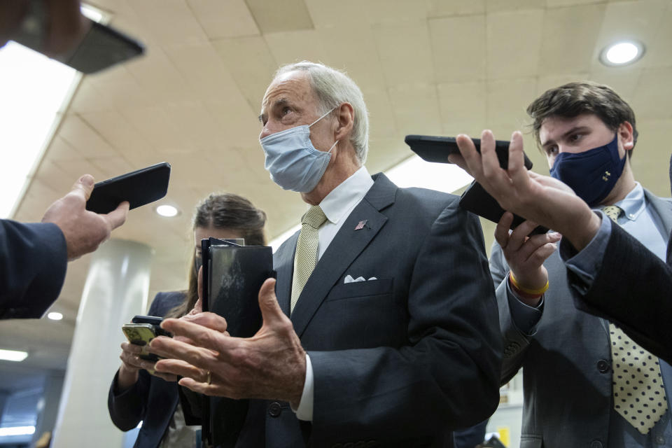 Sen. Tom Carper, D-Del., speaks to reporters amid continuing talks around the $1 trillion bipartisan infrastructure bill on Capitol Hill in Washington, Tuesday, Aug. 3, 2021. (AP Photo/Amanda Andrade-Rhoades)