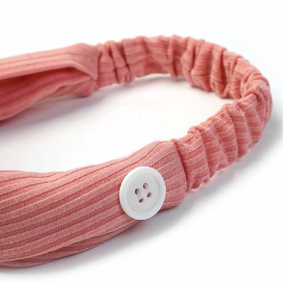 The buttons help take the stress off your ears when wearing a mask. (Photo: Amazon)