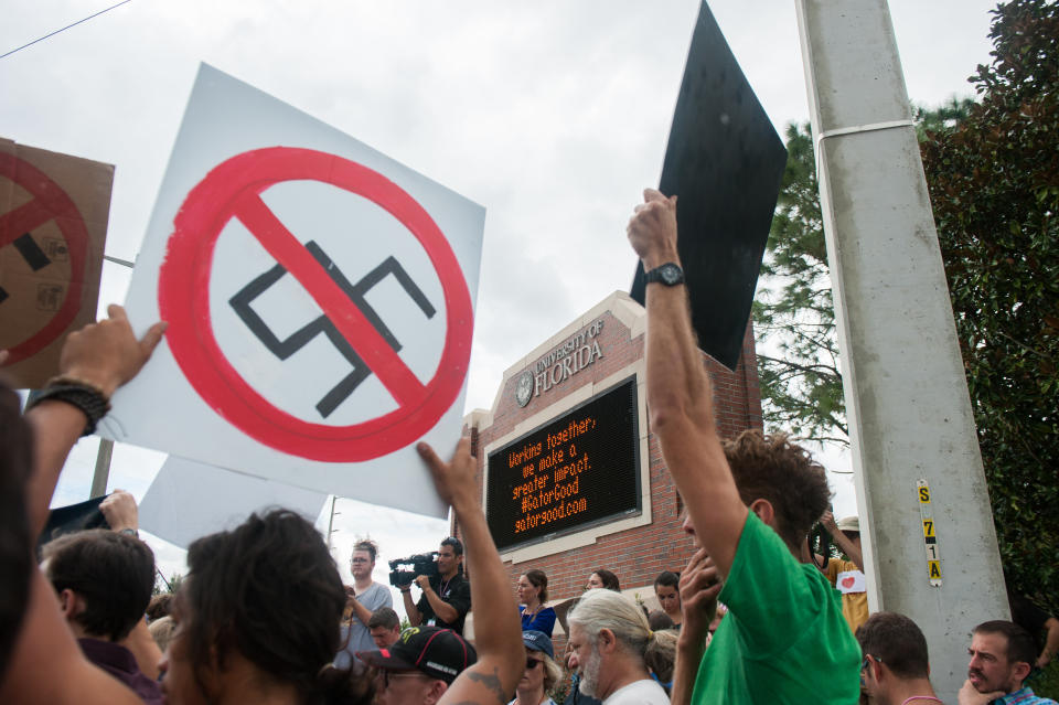 People protest near the Hull Road entrance to University of Florida. (Photo: Chris McGonigal/HuffPost)